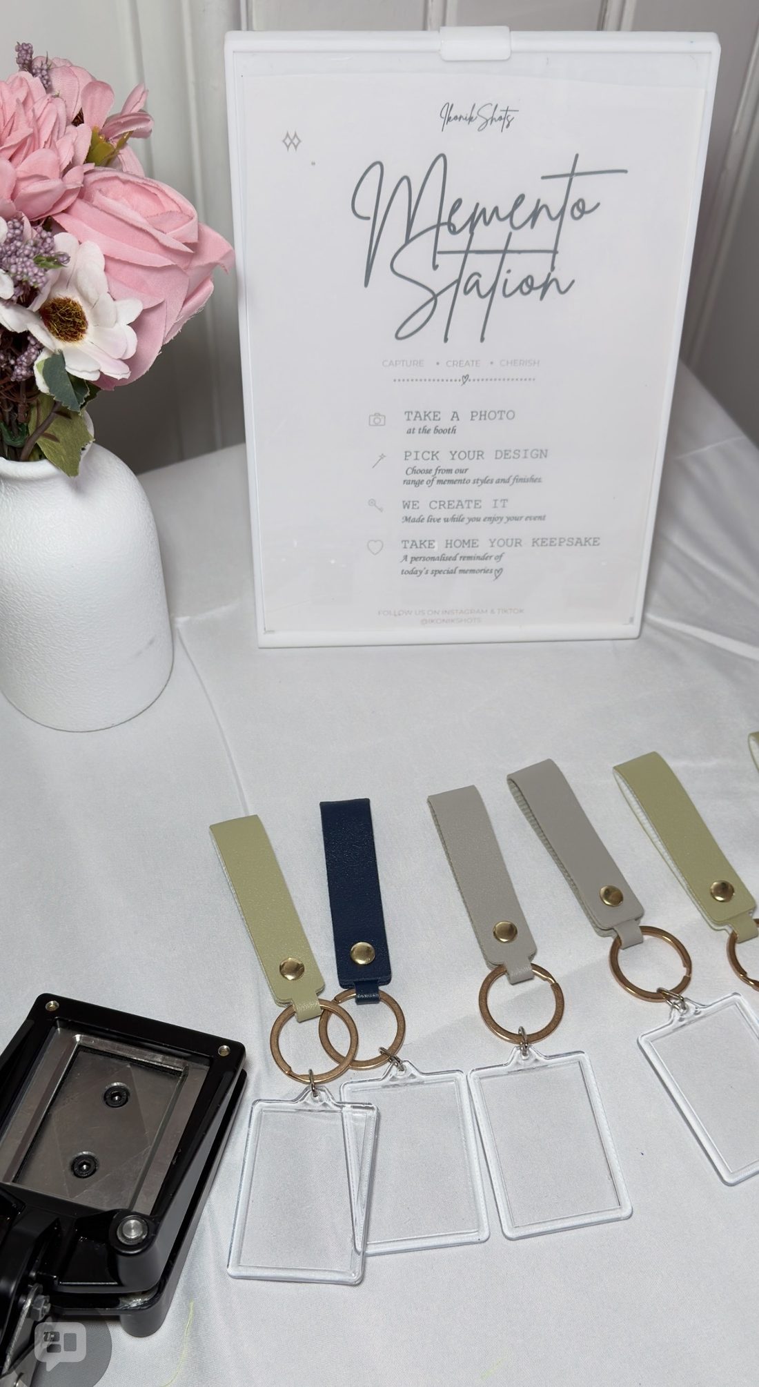 The Memento Station set up with keyrings ready to make